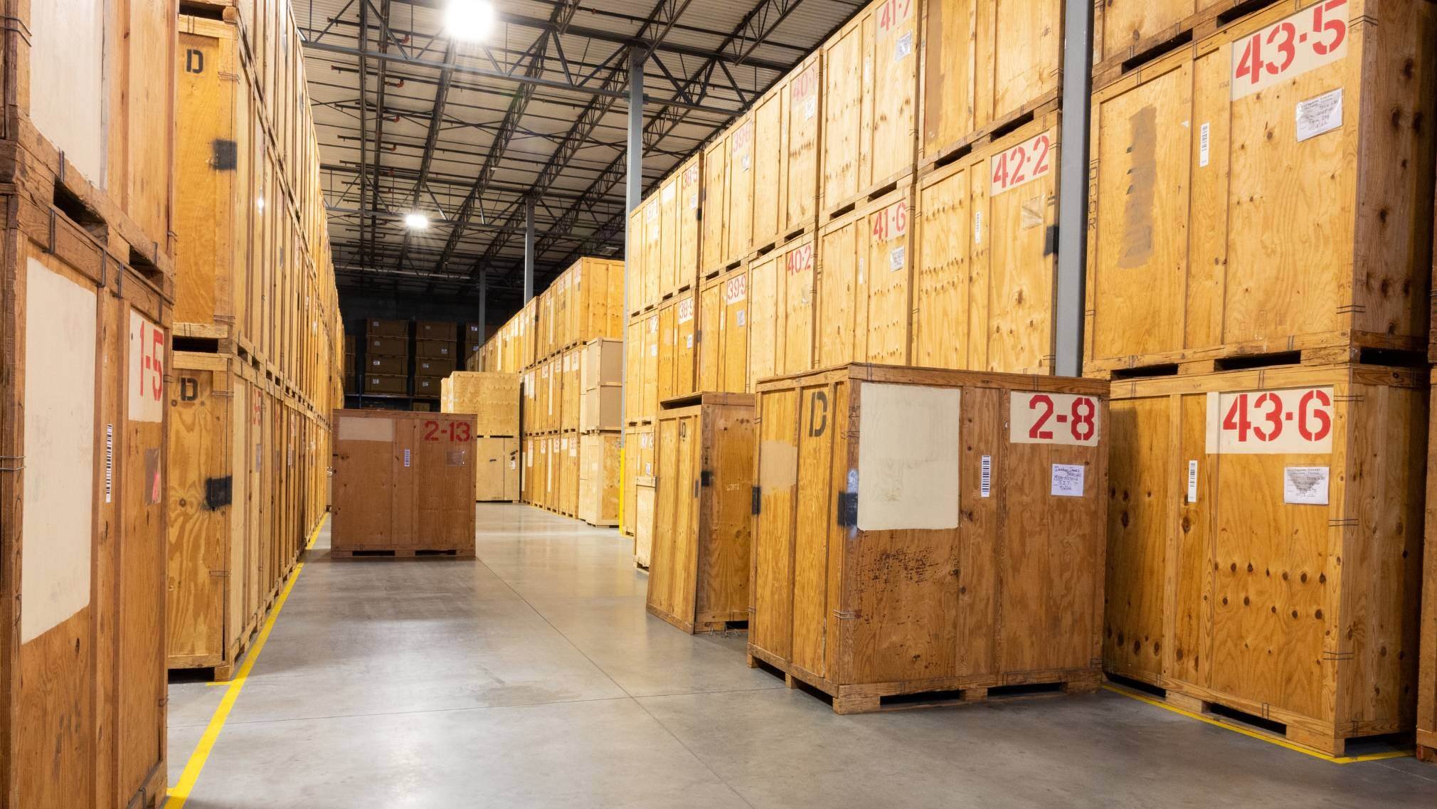stacks of storage vaults in a warehouse