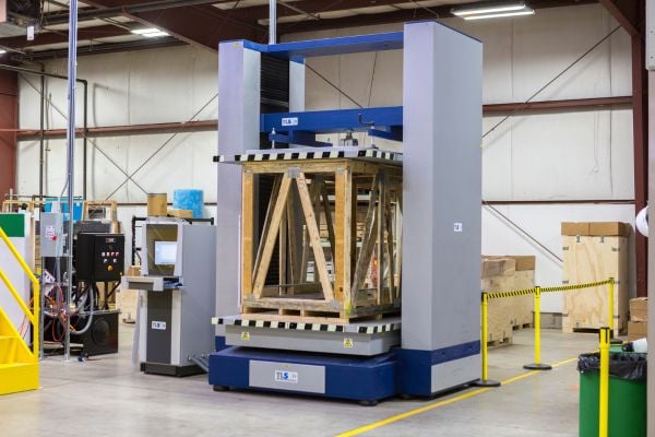 UFP Packaging facility testing the structural integrity of a wooden crate